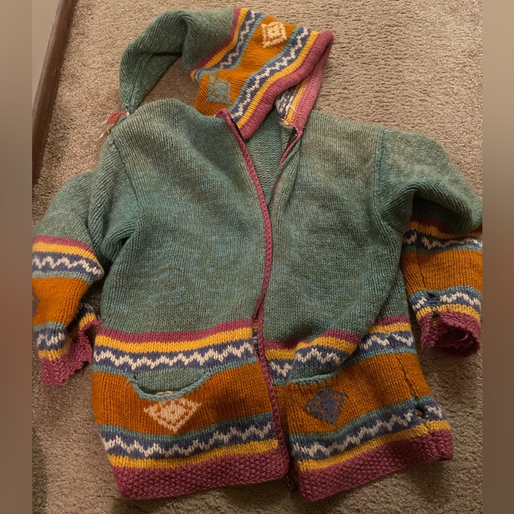 In desperate need of a Gypsy Rose Wool Handmade in Nepal Sweater or Jacket.